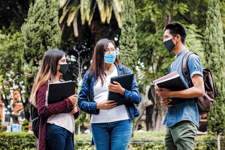 mexican students wearing mask face to prevent infection or respi